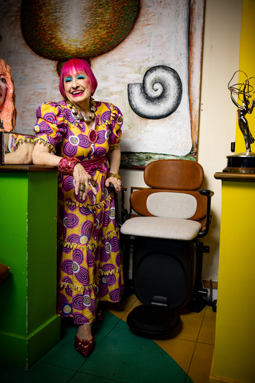 Dame Zandra Rhodes with the Stannah 158 stairlift